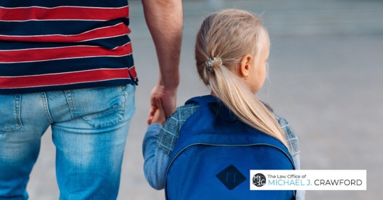 parent and child going to school